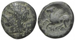 Sicily, Syracuse, 344-317 BC. Æ (18mm, 4.87g, 6h). Laureate head of Apollo l.; amphora(?) behind. R/ Pegasos flying l.; monogram below. CNS II, 85; SN...