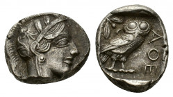 Attica, Athens, c. 454-404 BC; AR Tetradrachm (25,03 mm, 17,19 g). Helmeted head of Athena r. R/ Owl standing r. with closed wings; on l., olive twig ...