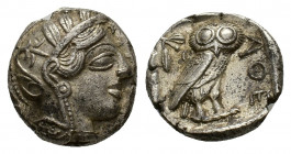 Attica, Athens, c. 454-404 BC; AR Tetradrachm (23,52 mm, 17,18 g). Helmeted head of Athena r. R/ Owl standing r. with closed wings; on l., olive twig ...