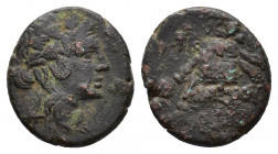 Pontos, Amisos, time of Mithradates VI, c. 85-65 BC. Æ (20, 29 mm, 7,70 g). Head of Mithradates VI as Dionysos, wearing ivy wreath. R/ Thyrsos leaning...