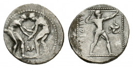 Pamphylia, Aspendos, c. 380/75-330/25 BC. AR Stater ( 10,72 g). Two nude wrestlers, standing and grappling with each other; between them, AA. R/ Sling...