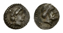 Cilicia, Nagidos, c. 420-380 BC. AR Obol (9,81 mm, 0,71 g). Head of Aphrodite r., 
hair pulled up at top of head; N behind. R/ Bearded male head r. SN...