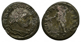 Diocletian (284-305). BI follis (26,31 mm, 8,44 g). Uncertain mint. Laureate head r. R/ Genius standing l., wearing modius, holding patera from which ...