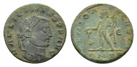Licinius (308-324). Æ Follis (23,13 mm, 6, 43 g). Thessalonica, AD 308-310. Laureate head r. R/ Genius standing l., wearing modius, holding patera fro...