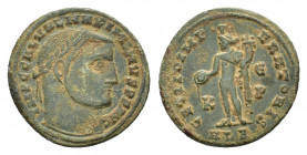 Maximinus II (309-313). AE follis (24,00 mm, 5,93 g). Alexandria, AD 308-309. Laureate head r. R/ Genius standing l., wearing modius, holding patera f...