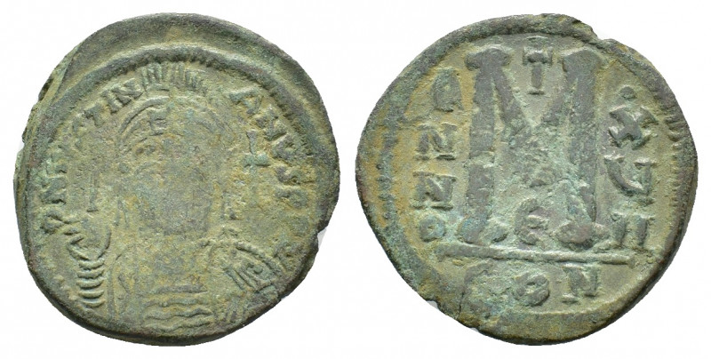 Justinian I (527-565). Ӕ Follis (33,17 mm, 20,12 g). Constantinople, AD 543-544....