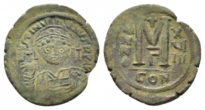 Justinian I (527-565). Ӕ Follis (33,34 mm, 20,54 g). Constantinople, AD 545-546....