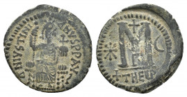 Justinian I (527-565). Æ Follis (32,29 mm, 16, 08 g). Theoupolis, AD 529-533. Emperor enthroned facing, holding long sceptre and globus cruciger. R/ L...