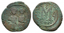 Justin II, with Sophia (565-578). Æ 40 Nummi (29,71 mm, 15,21 g). Constantinople, AD 570-571. Nimbate figures of Justin and Sophia seated facing on do...