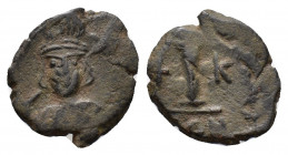 Constantine IV (668-685). Æ 10 Nummi (19mm, 3.64g). Facing helmeted bust, holding spear across shoulder. R/ Large I between cross and K. Sear 1183. Ne...