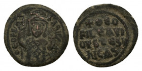 Theophilus (829-842). Æ 40 Nummi (). Constantinople, AD 829-842. Crowned facing bust, wearing loros, holding labarum and globus cruciger. R/ Legend in...