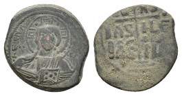 Anonymous. Æ 40 Nummi (27,04 mm, 10,59 g). Constantinople. Time of Romanus III (1028-1034). Nimbate facing bust of Christ, holding Book of Gospels. R/...