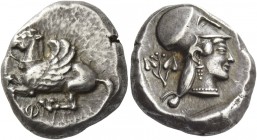 Corinthia, Corinth. Stater 500-450, AR 8.47 g. Pegasus flying l.; below, phi. Rev. Head of Athena r., wearing Corinthian helmet and pearl necklace; be...