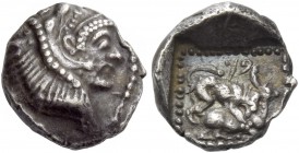 Baalmelek II, 425 – 400. Obol circa 425-400 BC, AR 0.92 g. Head of Heracles r., wearing lion’s skin. Rev. Phoenician characters Stag kneeling r., atta...