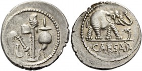 C. Iulius Caesar. Denarius, mint moving with Caesar 49-48, AR 4.02 g. Pontifical emblems: culullus, aspergillum, axe and apex. Rev. Elephant r., tramp...