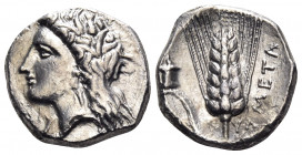 LUCANIA. Metapontion. Circa 330-290 BC. Nomos (Silver, 20 mm, 7.69 g, 9 h), struck under the magistrates Dex... and Ly... Head of Demeter to left, wea...