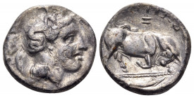 LUCANIA. Thourioi. Circa 350-300 BC. Nomos (Silver, 21 mm, 7.58 g, 11 h), struck under the magistrate Z... Head of Athena to right, wearing helmet ado...