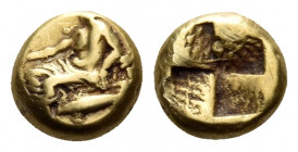 MYSIA. Kyzikos. Circa 500-450 BC. Hemihekte (Electrum, 8 mm, 1.36 g). Dionysos seated left, holding kantharos in his right hand; below, tunny to left....