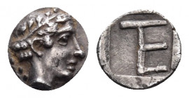 IONIA. Kolophon. Circa 450-410 BC. Tetartemorion (Silver, 7 mm, 0.36 g, 9 h). Laureate head of Apollo to right; behind head, vine with leaves. Rev. Mo...