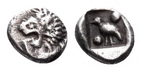 CARIA. Mylasa. Circa 420-390 BC. Tetartemorion (Silver, 6 mm, 0.30 g, 9 h). Forepart of a roaring lion to right, head turned back to the left. Rev. Bi...