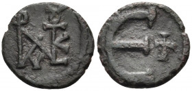 Justin II, 565-578. Pentanummium (Bronze, 13.5 mm, 1.48 g, 12 h), Theoupolis (Antioch). Monogram of Justin II. Rev. Large E; to right, cross. DOC 185....