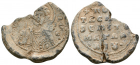BYZANTINE SEALS. Georgios (?) protospatharios and epi tou manglabiou, circa 11th century. Seal or Bulla (Lead, 28.5 mm, 10.26 g, 12 h), Constantinople...