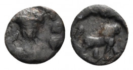 OSTROGOTHS. Rome. Baduila, 541-552. (Bronze, 8.5 mm, 0.39 g, 11 h), circa 549-552. [...] Crowned, draped and cuirassed facing of Baduila bust. Rev. Li...
