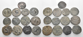 ISLAMIC. Circa 11th-13th century. (Bronze, 143 g). A lot of Thirteen (13) coins of various Islamic dynasties, mostly from the Ayyubid and Artuqid peri...