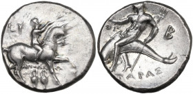Greek Italy. Southern Apulia, Tarentum. AR Nomos, c. 280-272 BC. Apollo, Eu-, and Thi-, magistrates. Obv. Youth on horseback right, holding reins and ...