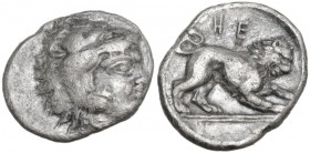 Greek Italy. Southern Lucania, Heraclea. AR Diobol, c. 432-420 BC. Obv. Head of Herakles right, wearing lion's skin. Rev. Lion right; above, HE. HN It...
