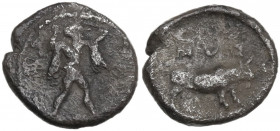 Greek Italy. Southern Lucania, Sybaris. AR Triobol, c. 440-400 BC. Obv. Poseidon advancing right, wearing chlamys, brandishing trident. Rev. Bull stan...