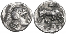 Greek Italy. Southern Lucania, Thurium. AR Triobol, c. 300-280 BC. Obv. Head of Athena right, wearing winged Attic helmet. Rev. Bull butting right; ab...