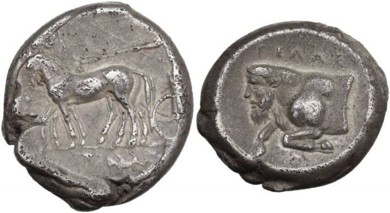Sicily. Gela. AR Tetradrachm, c. 420-415 AD. Obv. Slow quadriga driven left by c...