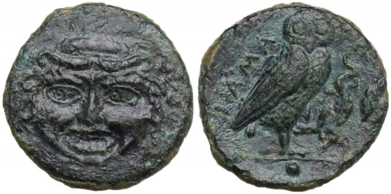 Sicily. Kamarina. AE Onkia, c. 420-410 BC. Obv. Gorgoneion facing, tongue slight...