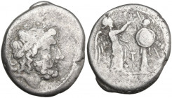 LT series. AR Victoriatus, Luceria mint, 214 BC. Obv. Laureate head of Jupiter right; below, archaic L. Rev. Victory standing right, crowning trophy; ...