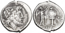 Anonymous. AR Victoriatus, 215-214 BC, Sicily (?). Obv. Laureate head of Jupiter right. Rev. Victory standing right, crowning trophy; in exergue, ROMA...