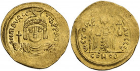 Maurice Tiberius (582-602). AV Solidus, Constantinople mint. Obv. ON mAVRC TIb PP AVC. Draped and cuirassed bust facing, wearing plumed helmet and hol...