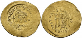 Maurice Tiberius (582-602). AV light Solidus (= 23 Siliquae), Constantinople mint. Obv. ON mAVRC- TIb PP AVG. Draped and cuirassed bust facing, wearin...