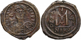 Maurice Tiberius (582-602). AE Follis, Nicomedia mint, 1st officina. Dated RY 7 (588/9). Obv. DN mAVRI TICERPI. Crowned and cuirassed bust facing, hol...