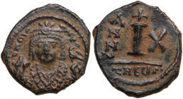 Maurice Tiberius (582-602). AE 10 Nummi (Decanummium). Theoupolis (Antioch) mint. Dated RY 10 (591/2). Obv. δn MA CN P A. Crowned bust facing, holding...