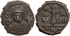 Maurice Tiberius (582-602). AE (imitative?) Decanummium. Uncertain mint. Obv. δ И A AUT. Crowned facing bust, wearing consular robes, holding mappa an...