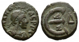 (Bronze, 2.65g 14mm) Anastasius I (491-518). Ae.5 Nummi Constantinople, 517-8. 
Diademed and draped bust right 
Rev. Large E; two pellets and Δ.