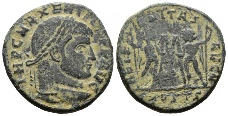 (Bronze, 5.99g 23mm) Maxentius (307-312). Ae. Follis 309-312. 
Laureate head ri...