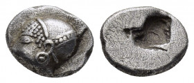 IONIA. Phokaia.(Circa 521-478 BC).Diobol.

Obv : Archaic female head left, wearing earring and helmet or close fitting cap.

Rev : Incuse square punch...