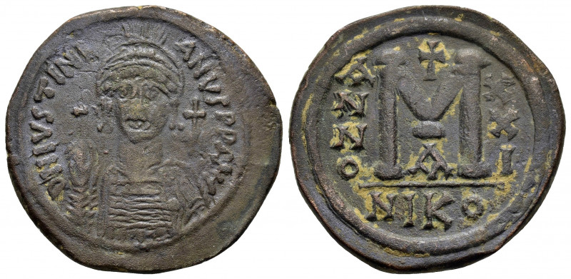 JUSTINIAN I.(527-565).Nicomedia.Follis.

Obv : DN IVSTINIANVS PP AVG.
Helmeted, ...