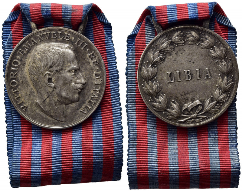 SAVOIA - Medaglia Guerra di Libia. Argento con nastrino originale, con cambretta...