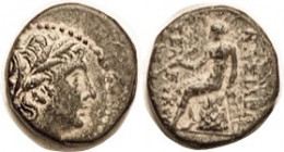 SYRIA, Seleukos III, 226-223 BC, Æ15, Apollo hd r/Apollo std l, VF, obv off-ctr to left but quite strong portrait detail; dark patina with orangy hili...