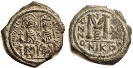 JUSTIN II, Follis, S369, NIKO-X-B, EF/VF, obv sl off-ctr on somewhat ragged flan, nice dark green patina with some paler green hilighting; figures sho...