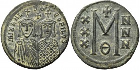 Michael II the Armorian, 820 – 829, with Theophilus from 821 (or 822). Follis 821-829, Æ 8.07 g. MIXAHL – S Θ – ΕΟFILVS Facing busts of Michael, on l....