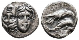 MOESIA, Istros. Circa 4th Century BC. AR Drachm. Facing male heads, the left inverted / Sea-eagle right, grasping dolphin with talons; Ð? below dolphi...